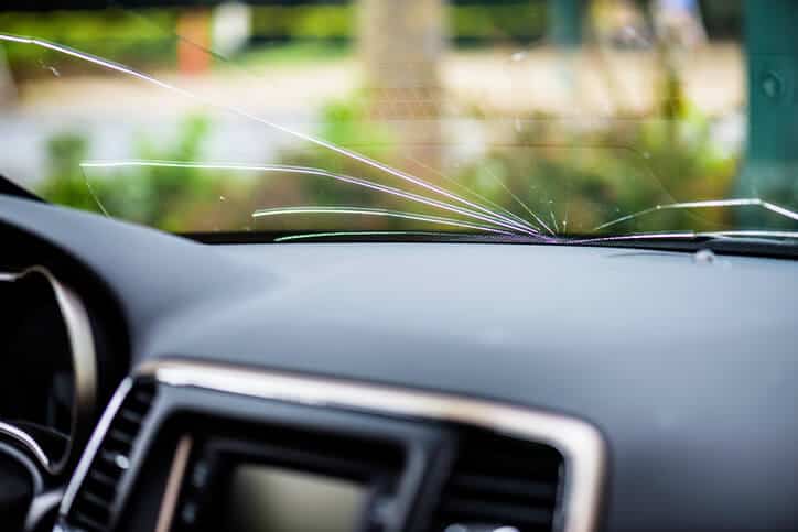 interior car view of a broken windshield